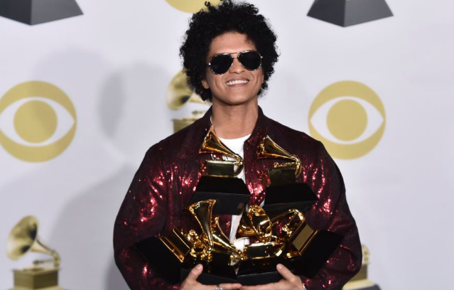 The three most coveted accolades of the 60th annual Grammy Awards were bestowed upon Bruno Mars for his double platinum album and record of the year